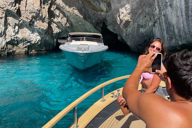 All-Inclusive Capri Boat Tour with City Visit from Positano - Punta Carena lighthouse at the right mood