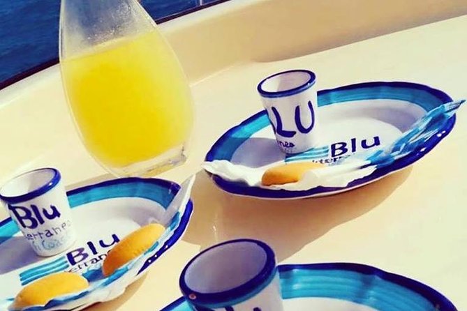 Amalfi Coast Boat tour Small Group - On board comfort: shade, restrooms, and the drinks-and-snacks vibe