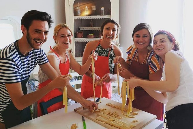 Authentic Cooking with Locals: Meal, Wine & Scenic Views - Getting there, then settling in near La Praia and Praiano landmarks