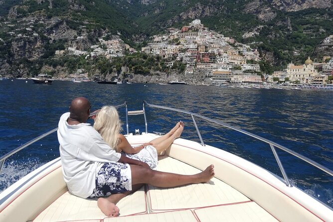 Boat Tour throughout the Amalfi Coast Amalfi and Positano - Cruising the Amalfi Coast: snorkeling coves and town-by-town scenery