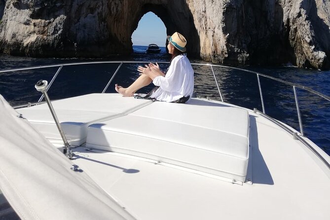 Boat Tour throughout the Amalfi Coast Amalfi and Positano - Onboard comfort: shade, lounge space, and the snack-and-drink reality