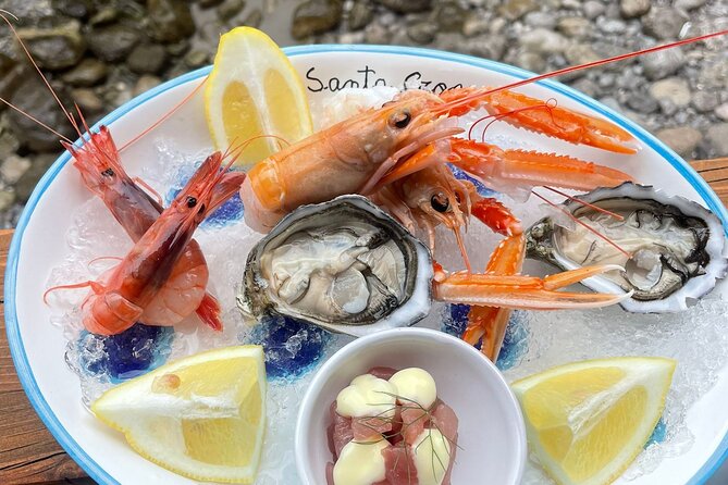 Boat tour with lunch overlooking the sea - Key highlights you should know before you go