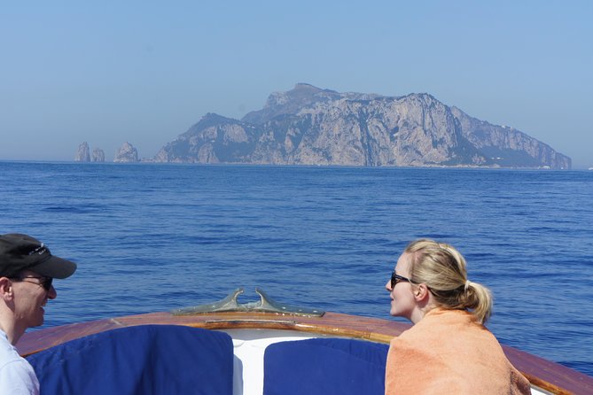 Capri & Blue Grotto Small Group Full-Day Boat Tour from Positano - Check-in at 8:00 sharp, and where to find the orange booth