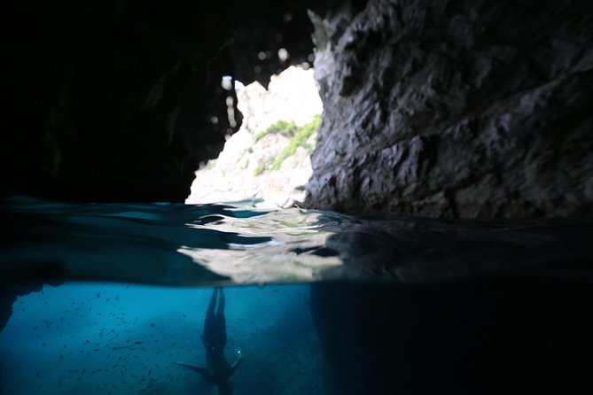 Capri Boat tour from Positano with Light Lunch, Drinks & Swim - Villa Malaparte, sea stacks, Punta Carena Lighthouse, and the Natural Arch