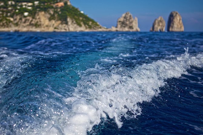 Capri Boat tour from Positano with Light Lunch, Drinks & Swim - Lunch and drinks onboard: Caprese sandwich, Prosecco, and the limoncello toast