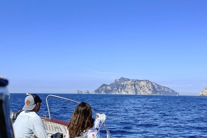 Capri Boat Tour - Snorkeling, Sunset & Blue Grotto from Positano - Meeting at Spiaggia Grande and Getting Comfortable Fast
