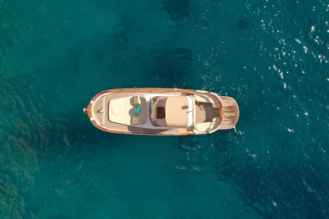 Capri by Sea: A Private Boat Adventure with Blue Grotto - White Grotto and Tiberius’ Leap: Finishing With Legends and Sea Cliffs