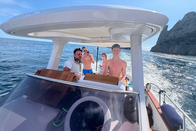 Capri Full Experience:Blue Grotto+Faraglioni Swim+City Visit - Marina Piccola, Sirens’ Rock, and Faraglioni by Boat