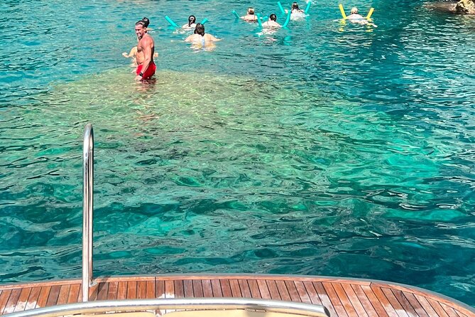 Capri in a Day from Positano by Premium Boat Tour + City Visit - Cala del Rio and the Heart Cave moment