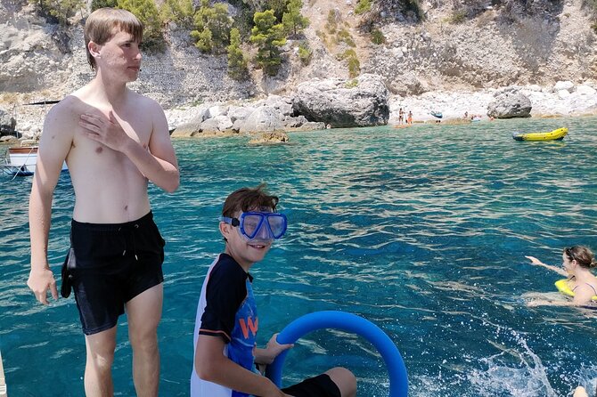 Capri Premium Private Boat Tour + City Visit - Punta Carena Sunset Views and the Saints and Green Grottos