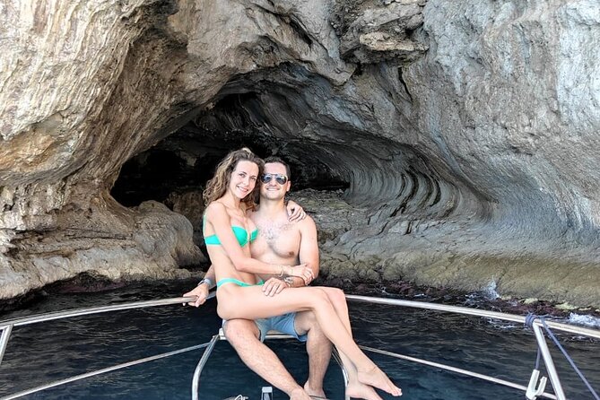 Capri Premium Private Boat Tour + City Visit - Villa Jovis Cliff Legend and the Scugnizzo Statue