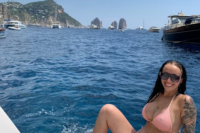 Capri Private all inclusive Boat Tour with City Exploration - Cala del Rio, Grotta Iannarella, and Cala del Tombosiello: small coves with famous owners