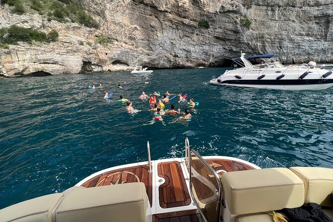 Capri Private all inclusive Boat Tour with City Exploration - Faro di Capri and sunset energy at Punta Carena lighthouse