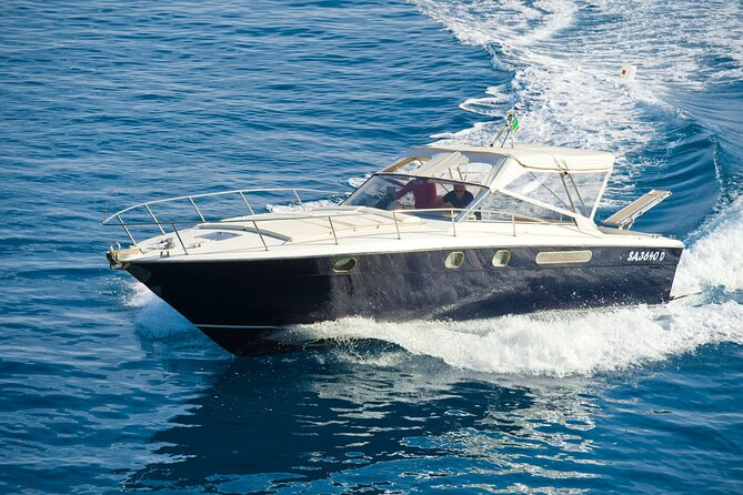 Capri Private Boat Excursion with Faraglioni and Blue Grotto - White Grotta, Natural Arch, and the fast photo stops