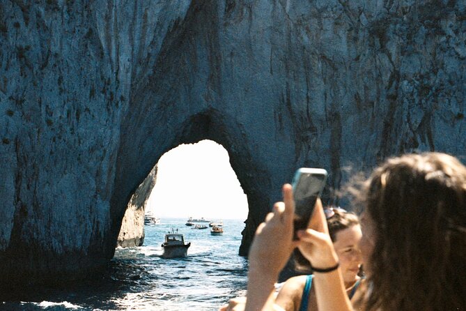 Capri Private Boat Excursion with Faraglioni and Blue Grotto - Punta Carena and the return route: lighthouse views and coves