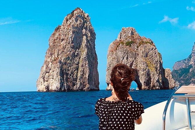 Capri Private Boat Tour Gozzo Skipper Lunch Drinks - Capri by Boat: Faraglioni Wishes, Caves, and a Smooth Visual Tour