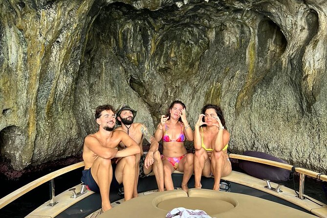 From Positano : Elite Capri Boat Day Free Bar, Brunch & City Walk - Punta Carena lighthouse: old light, calm sea, and sunset timing