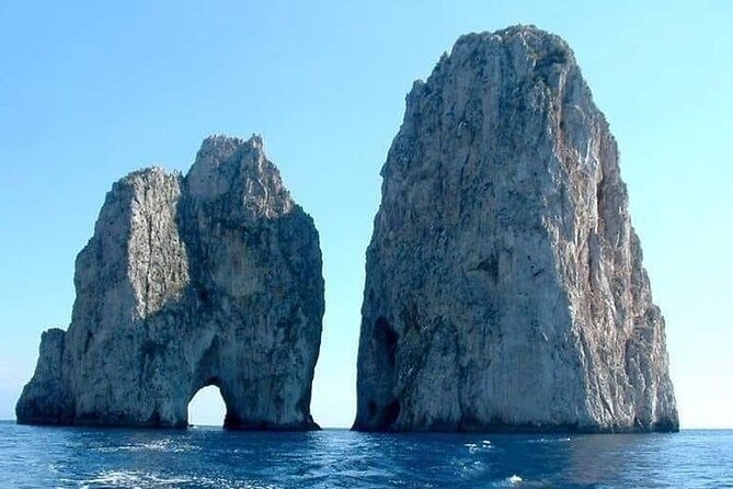 Full Day Boat Tour from Amalfi to Capri - Stop 2 I Faraglioni: cruise under the icons, then swim