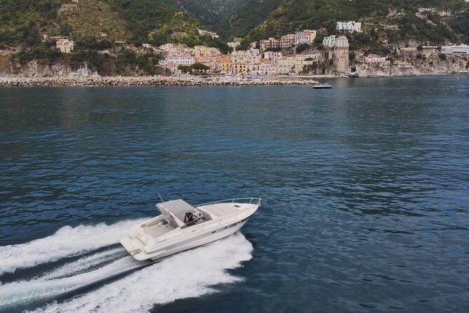 Full day luxury trip around Amalfi Coast and Capri - Getting on board in Amalfi: timing, meeting point, and pickup