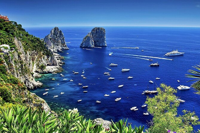 Full Day Private Boat Tour to Capri from Positano - Capri arrival moments: Spiaggia Grande and Bagni di Tiberio