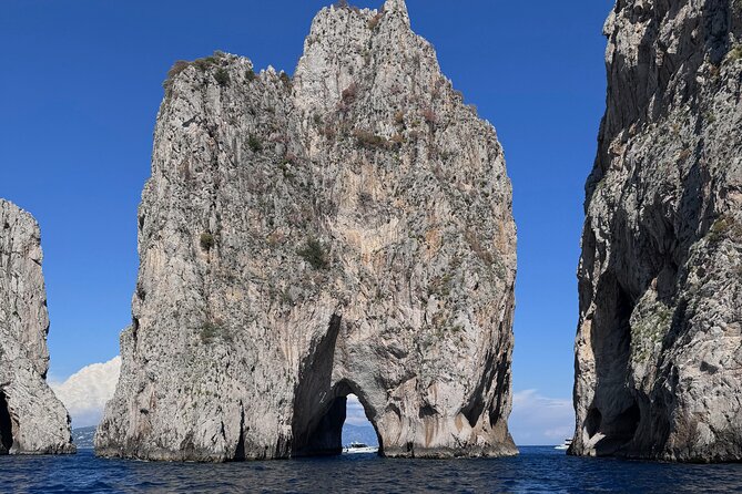 Futura Capri/Amalfi Private Boat Tour - Grottos' Visit - Tiberius’ Leap: legend, cliff views, and what to expect at the site