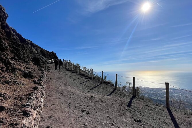 Pompeii & Vesuvius & Lunch from Positano All Inclusive - Getting there: air-conditioned transfer and a group that stays small