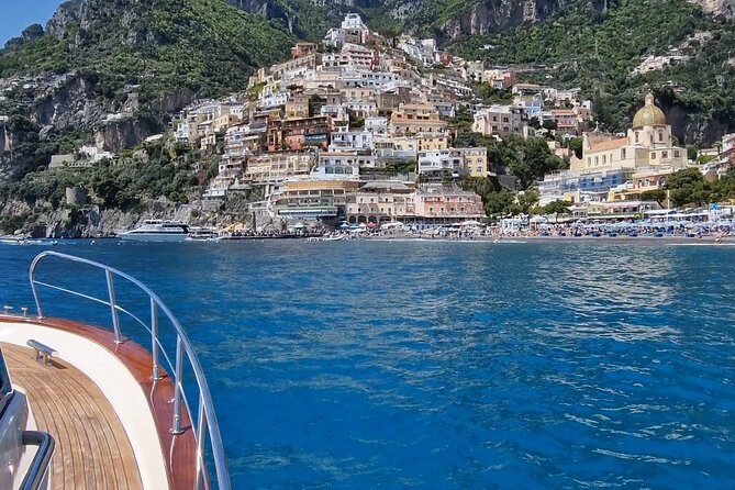 Private Boat Tour Along the Amalfi Coast from Positano - Private Gozzo boat from Positano, in plain terms