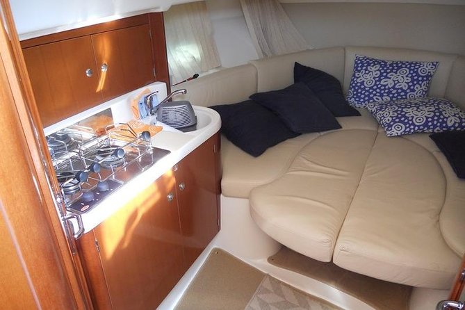 Private Boat Tour of Amalfi Coast and Capri by Jeanneau Leader - Capri by sea: White Grotto, Faraglioni, Marina Piccola, and your cave choices