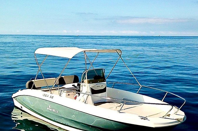 Private Boat Tour of the Amalfi Coast with Aperitif - Luigi-style guiding: landmarks, local context, and music you choose