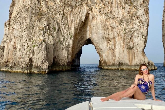 Private boat tour to Capri from Amalfi Coast. Drinks included - Faraglioni Rocks: Stella, Mezzo, and Scopolo From Your Boat