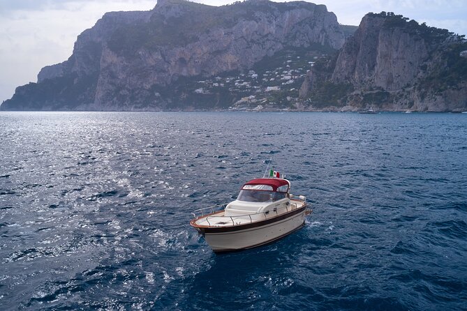 Private Boat Tour with 36 feet Di Luccia - Cruising Positano to Capri, with Li Galli’s siren-story feeling