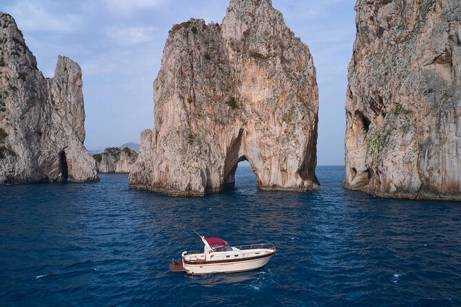 Private Boat Tour with 36 feet Di Luccia - I Faraglioni: towering stacks and a close pass at Faraglione di Mezzo