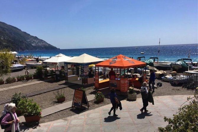 PRIVATE CAPRI ISLAND & BLUE GROTTO Full Day boat tour. - Onboard setup: showers, towels, drinks, and room to breathe