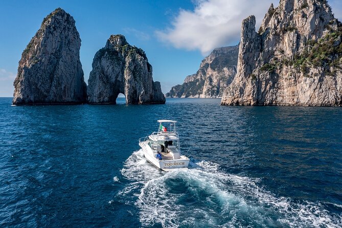 Private Day Boat Trip to Capri and Blue Grotto from Positano - Natural Arch and I Faraglioni: the best photo time comes with bathroom reality