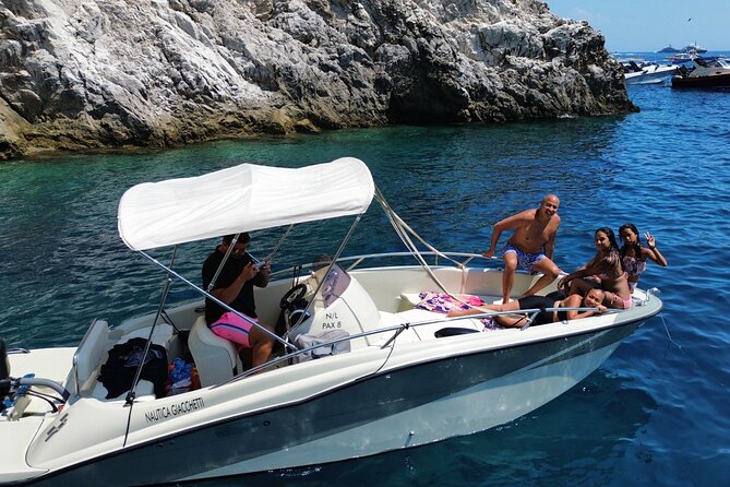 Private Full-Day Capri Boat Tour DA Positano - I Faraglioni: photos and sea views that feel like Capri math