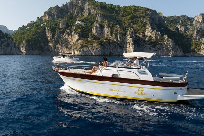 Private Ischia Boat Tour from Positano: Full Day Trip - Leaving Positano: Amalfi Coast views you only see from the right angle