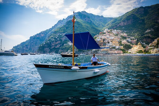 Simply Amalfi Coast Private Boat Tour con Giovanni - Giovanni at the helm: friendly, communicative, and practical
