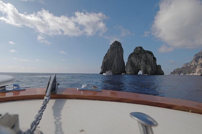 Small Group Day Trip to Capri from Positano or Praiano - The cruise stops before Capri: White Grotto, Natural Arch, and the Faraglioni views