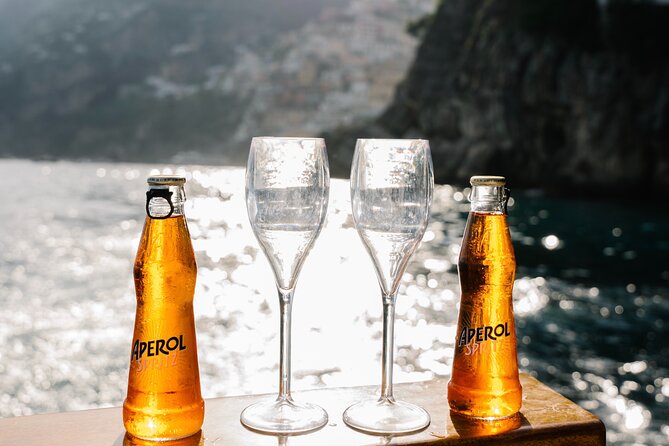 Small Group Tour in Positano by Boat at Sunset with Prosecco - What you get on board, and what you should bring