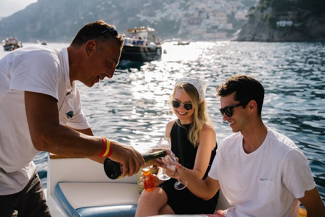 Small Group Tour in Positano by Boat at Sunset with Prosecco - The sail out of Positano: Prosecco cruising with quick stops for atmosphere