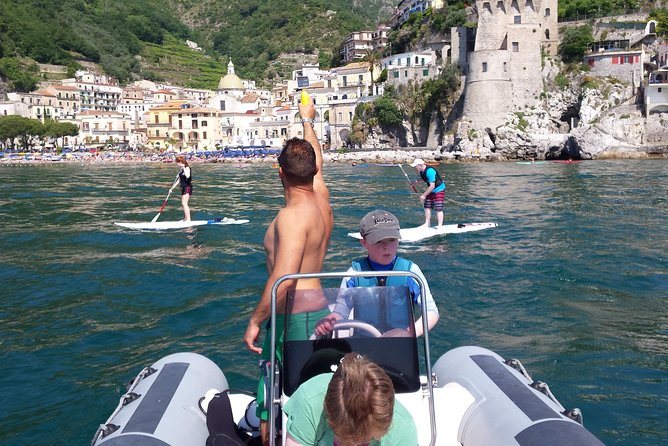 Stand Up Paddle guided tour through Amalfi Coast - The boat follow-along: rest, sunbathing, snorkel time, and aperitif vibes